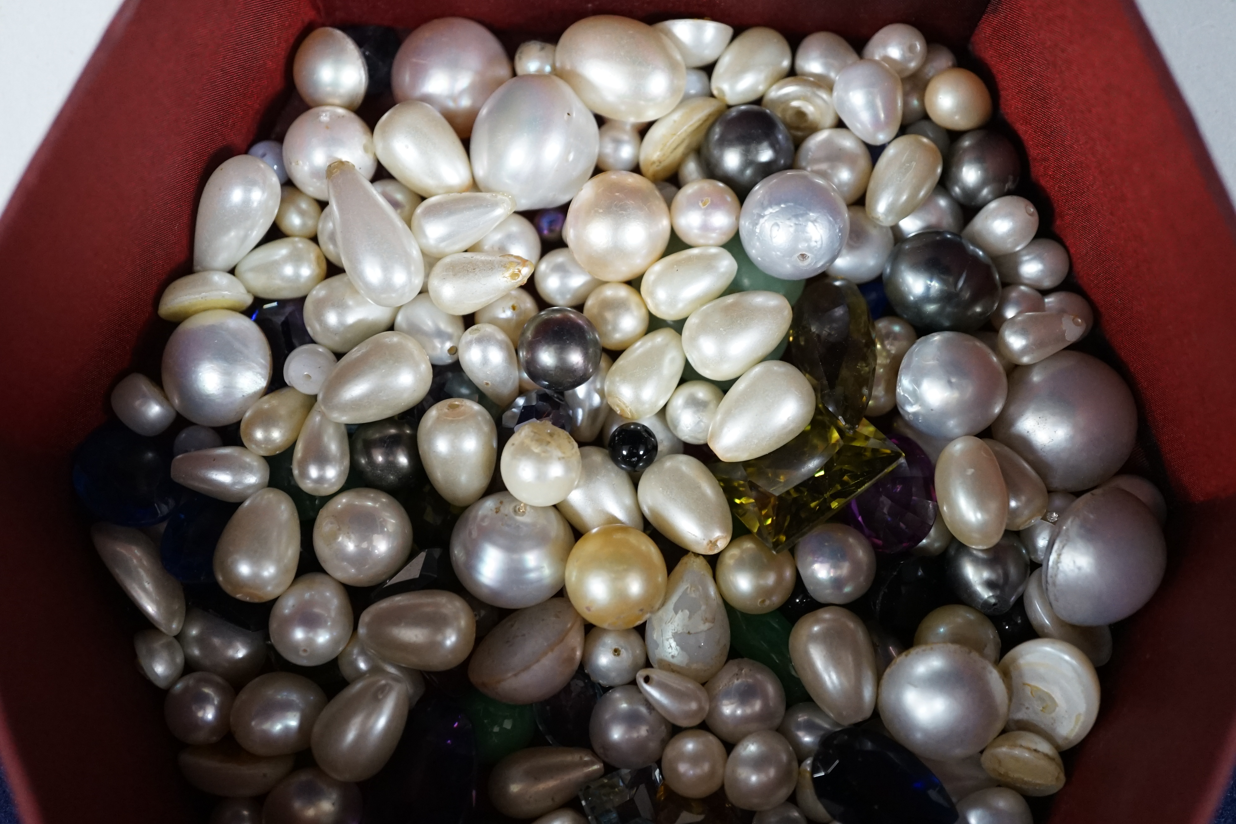 A small collection of assorted unmounted stones and paste. Condition - poor to fair